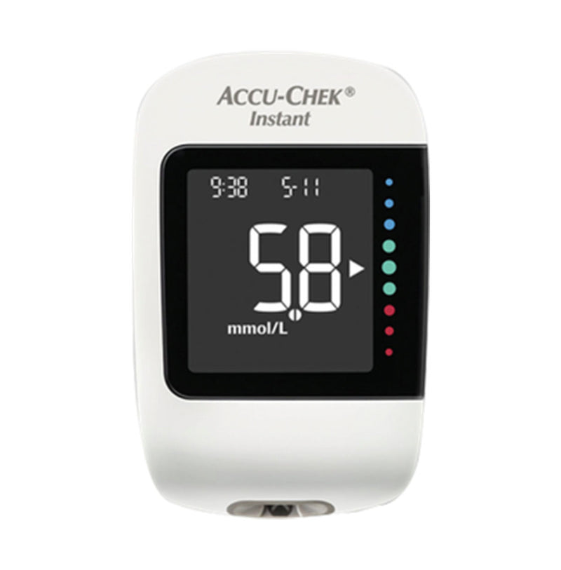 Accu-Chek Instant Meter Kit glucose meter showing a 5.8 mmol/L reading
